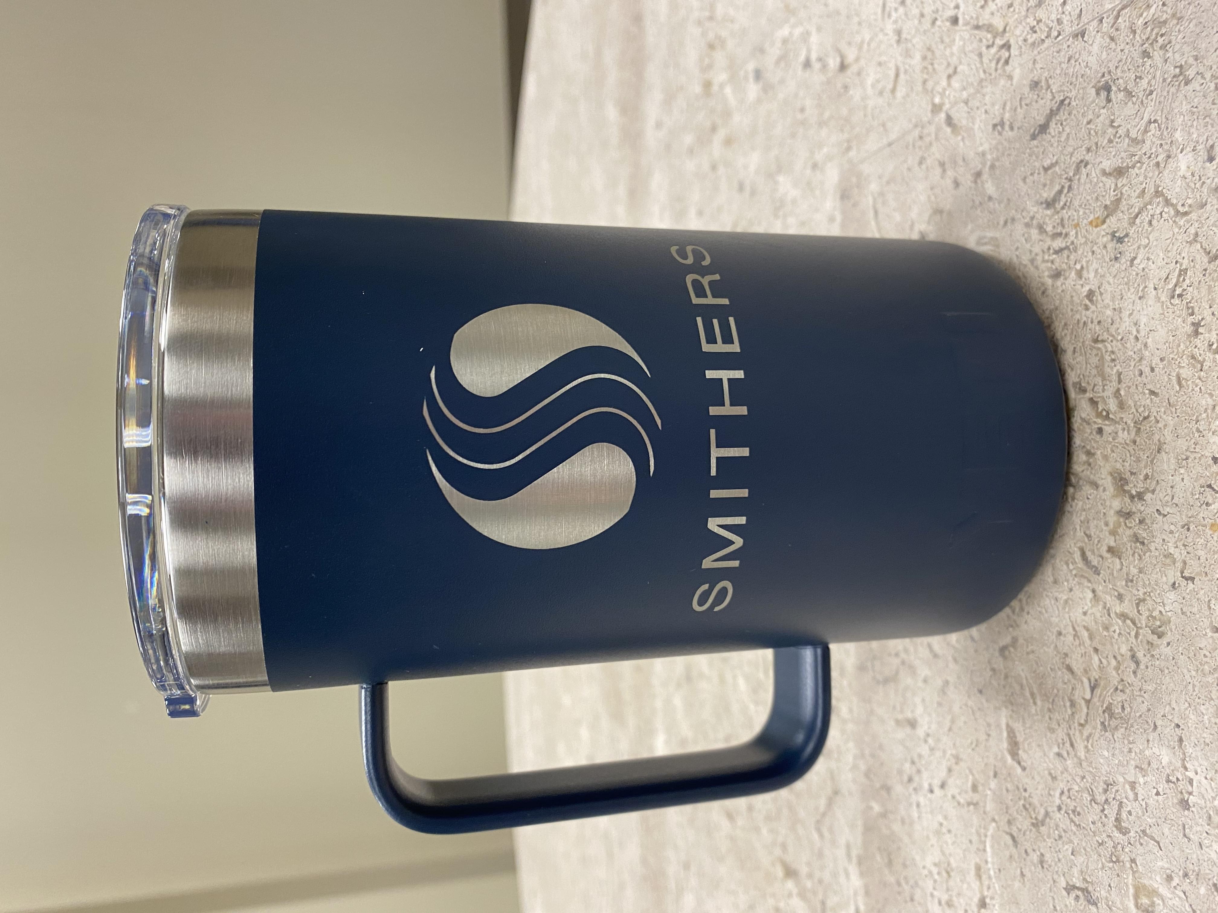 Smithers logo on navy blue Yeti mug